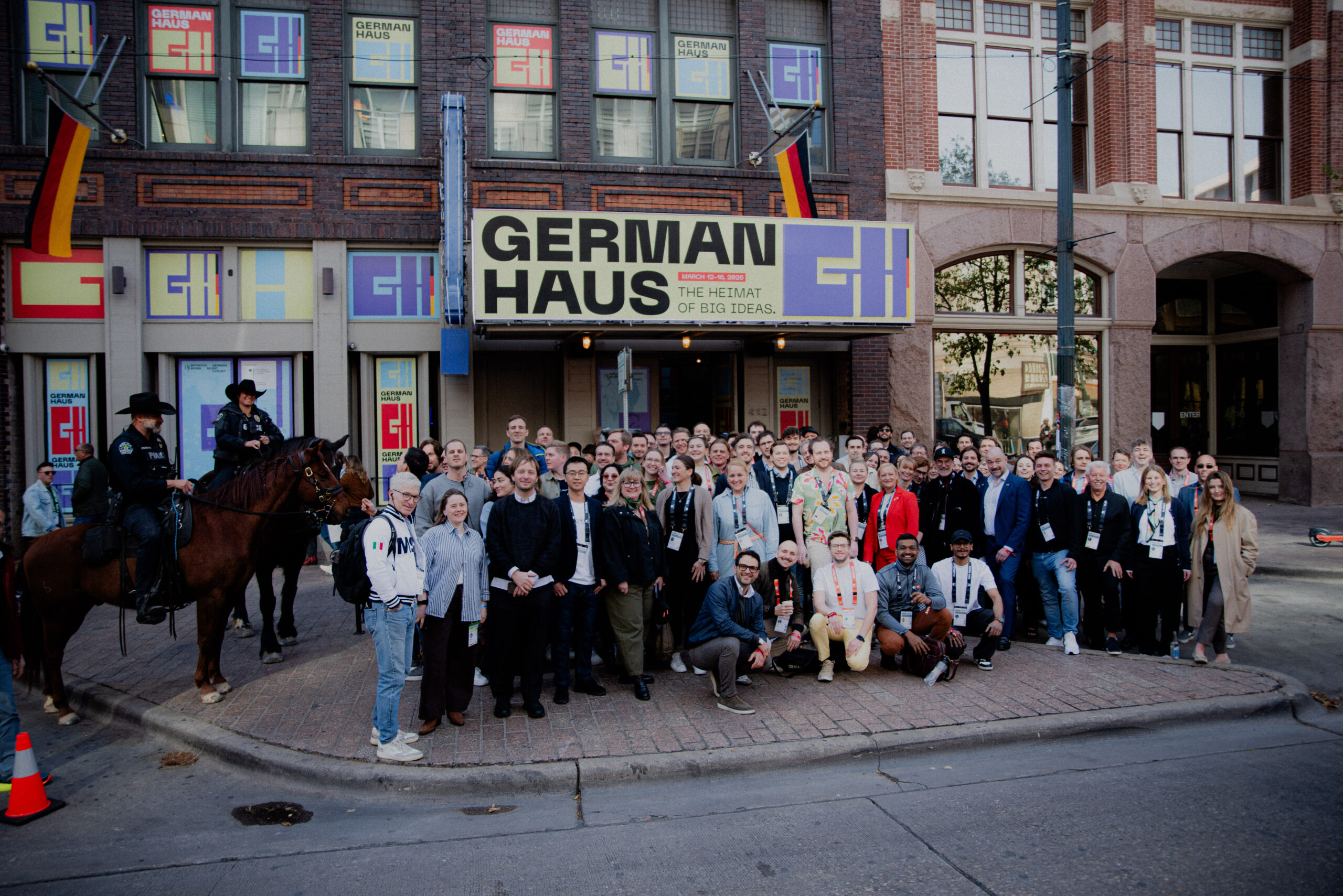 German house in Austin with a group of people in front of it